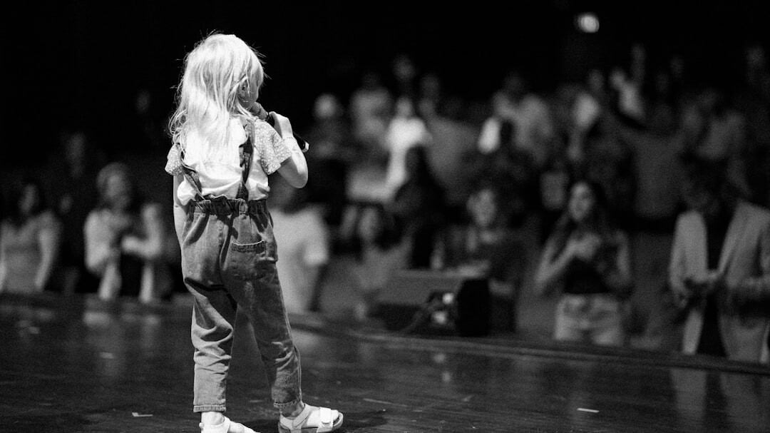 young actor auditioning on stage