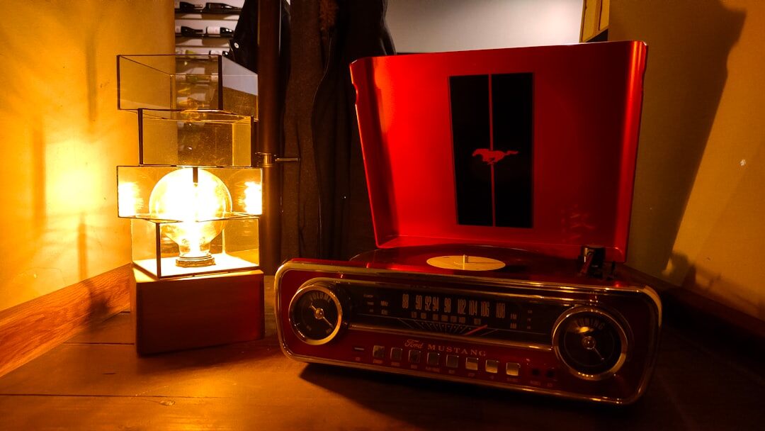 Vintage vinyl records and record player in warm light